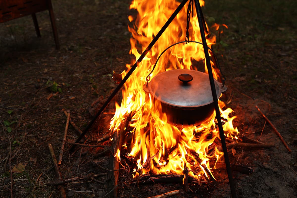 cooking-outdoors-in-field-conditions-cauldron-on-2023-01-04-02-17-28-utc (1)