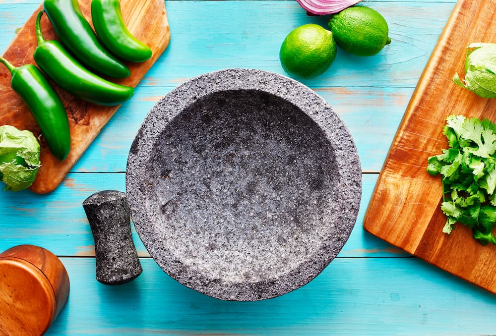 empty-molcajete-on-table-with-ingredients-ready-to-2022-03-26-11-51-00-utc (1)